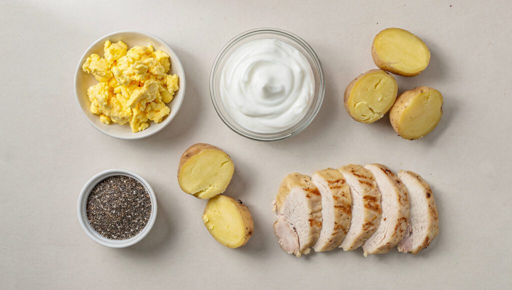 How to Stay Full in a Calorie Deficit (Without Feeling Deprived) Healthy meal ingredients arranged neatly