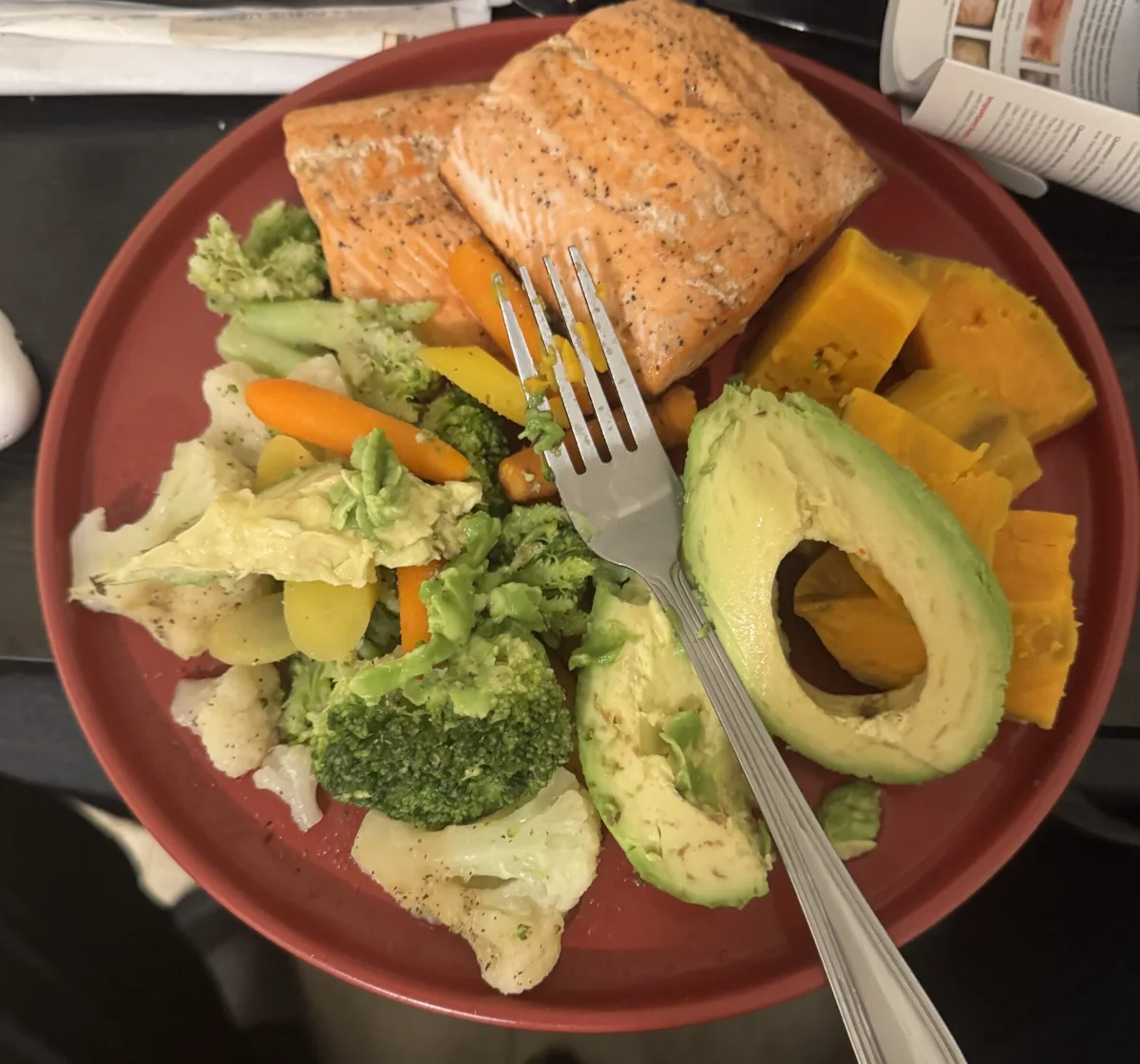 Easy High Protein Dinners: 6 Filling Bowls Ready Fast Homemade plate of baked salmon, roasted sweet potato, mixed vegetables and avocado